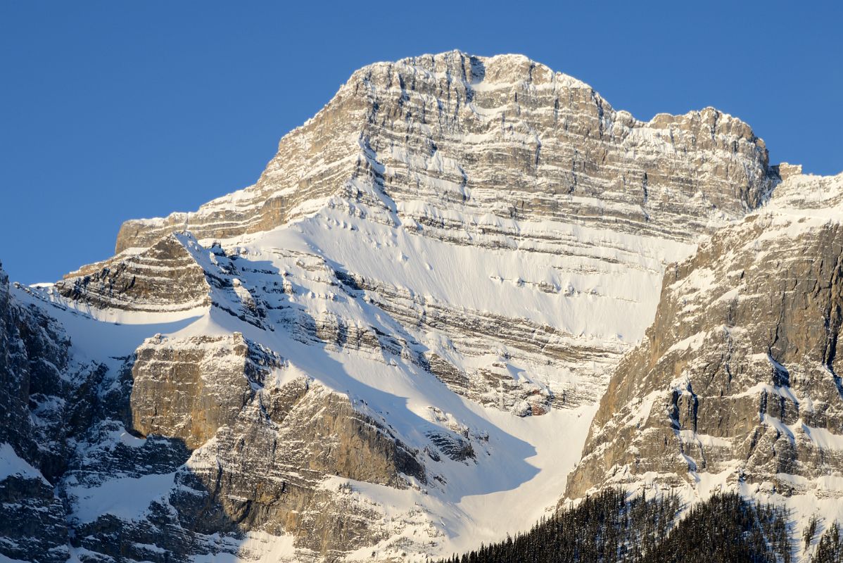 20B Mount Rundle Main Summit Close Up Just After Sunrise From Trans Canada Highway Between Canmore And Banff In Winter
